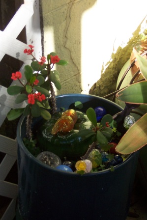 Various pieces adorning a planter